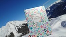 Kleiner Gamsstein: Buntes Gipfelbuch mit freudigem Titel | Bild: BR/Ulrike Nikola