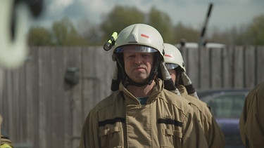 Thomas Hoppe in Feuerwehrkluft | Bild: BR