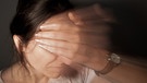 Frau mit Kopfschmerz | Bild: picture-alliance/dpa