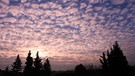 Wolken und Farbenspiel beim Sonnenaufgang bei Oberwerrn. | Bild: Jürgen Mauder, Oberwerrn, 15.12.2023