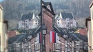 Spieglein, Spieglein? Reflexion in der Miltenberger Altstadt mit Blick zur Mildenburg. | Bild: Roland Schönmüller, Miltenberg, 01.03.2024