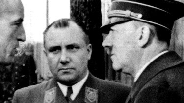 Martin Bormann (m) und Adolf Hitler (r) | Bild: picture-alliance/dpa
