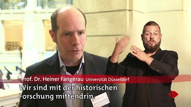 Prof. Dr. Fangerau mit Dolmetschereinblendung | Bild: Bayerischer Rundfunk