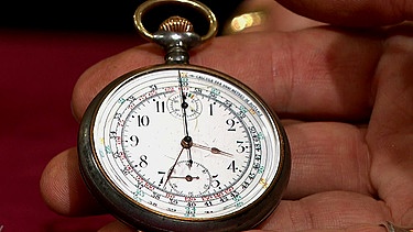 Wie viele Meter pro Sekunde werden zurückgelegt? Der Chronograph zeigt nicht nur die Uhrzeit, er misst auch die Geschwindigkeit und hat ein patentiertes Zifferblatt. Worin besteht das Patent? Geschätzter Wert: 400 Euro  | Bild: Bayerischer Rundfunk