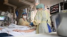 Pflegerin auf einer Covid-Intensivstation | Bild: pa/dpa/