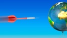 Ein Dartpfeil fliegt auf einen Luftballon zu auf den die Weltkarte gemalt ist. | Bild: picture alliance / Zoonar | DesignIt