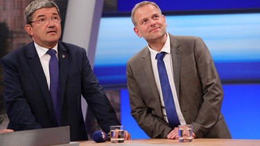 Der Spitzenkandidat der Partei Alternative für Deutschland (AfD), Leif-Erik Holm (r) und der Spitzenkandidat der CDU, Lorenz Caffier | Bild: picture-alliance/dpa