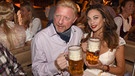  Boris Becker und seine Frau Lilly posieren am 18.09.2016 in München (Bayern) im Käferzelt. | Bild: dpa-Bildfunk/Felix Hörhager 
