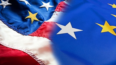 Eine amerikanische und eine EU-Flagge bei denen jeweils die Farbe eines Sterns ausgetauscht wurde | Bild: colourbox.com; Montage: BR