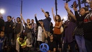US-Bürger bekunden ihren Friedenswillen | Bild: picturealliance / dpa - Eugene Garcia