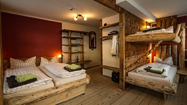 Zimmer in der Alpin Lodge Auenhütte in Hirschegg | Bild: Alpinlodge Auenhütte