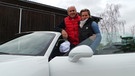 Justin fährt mit Hans-Joachim Stuck im Rennauto | Bild: BR