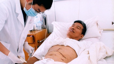Chinesischer Patient mit Organtransplantat | Bild: picture-alliance/dpa