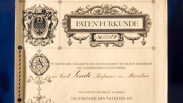 Patenturkunde vom kaiserlichen Patentamt für Carl von Linde und dessen Verfahren zur Verflüssigung atmosphärischer Luft oder anderer Gase | Bild: picture-alliance/dpa