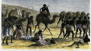 Sklavenkarawane auf dem Weg zur Einschiffung nach Arabien,  Holzstich (1884) | Bild: picture-alliance/dpa