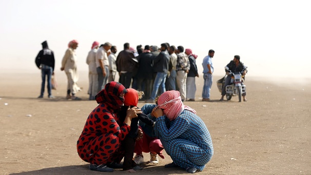 Syrische Flüchtlinge an der Grenze zur Türkei | Bild: picture-alliance/dpa