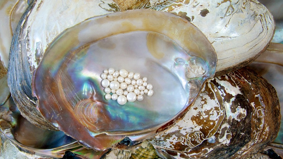 Symbolbid: Schimmernde Perlen | Bild: colourbox.com