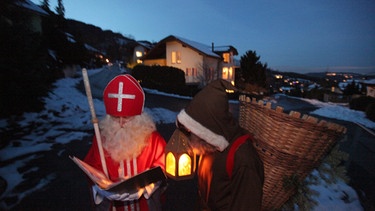 Der heilige Nikolaus und sein Begleiter Knecht Ruprecht | Bild: picture-alliance/dpa