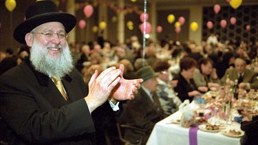 An Purim geht es in jüdischen Gemeinden wie an Fasching zu | Bild: picture-alliance/dpa