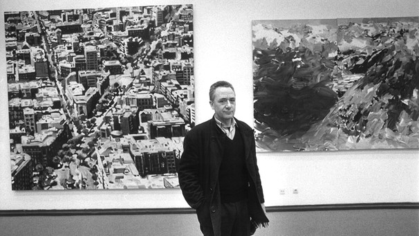 Gerhard Richter 1986 zwischen Stadtansicht Madrid und Alpen | Bild: picture-alliance/dpa