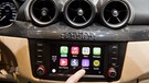 Apples Connected-Car-Plattform Carplay auf dem Display eines Autos | Bild: picture-alliance/dpa