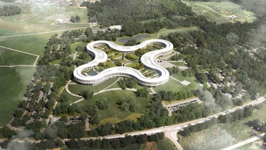 Luftaufnahme eines kleeblattförmigen Gebäudes | Bild: Herzog & Meuron