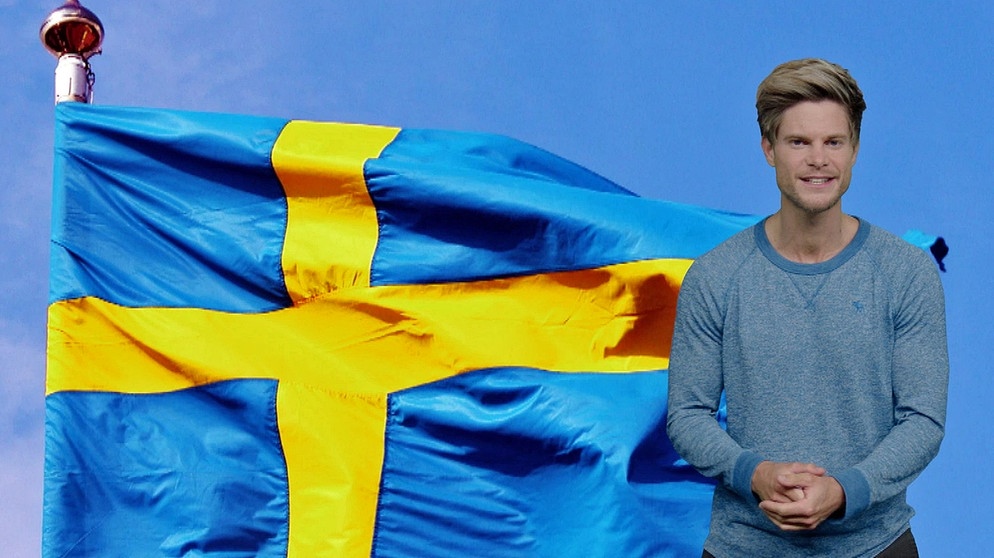 Philip Häusser vor schwedischer Flagge | Bild: BR