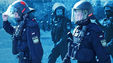 Polizeibeamte des USK  | Bild: BR