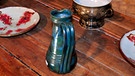 Tisch mit Keramik | Bild: picture-alliance/dpa