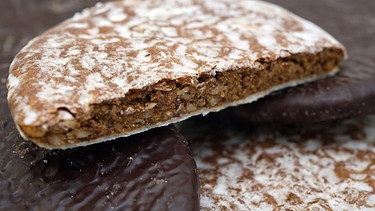 Elisenlebkuchen mit Schokoladenüberzug und Zuckerguss | Bild: picture-alliance/dpa/Themendienst