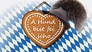 Trachtenhut und Lebkuchenherz mit der Aufschrift "A Hund bist fei schon!" | Bild: colourbox.com, Montage: BR
