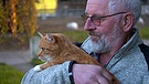 Mann mit Katze | Bild: BR