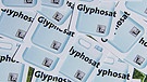Zettel mit "Glyphosat"-Schriftzug | Bild: BR