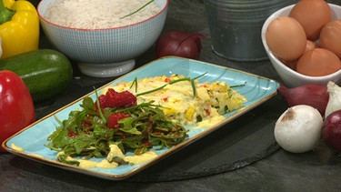 Reis-Tortilla mit Rucola und Knoblauch-Senf-Soße  | Bild: BR
