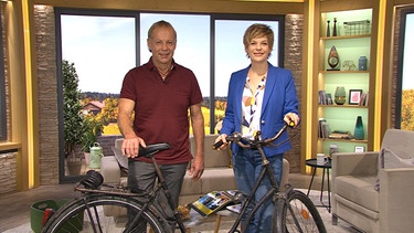 Damenrad-Radler Günter Herbst und Moderatorin Sandra Bouscarrut | Bild: BR
