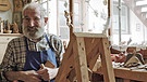 Holzschnitzer Buchwieser aus Grainau | Bild: BR