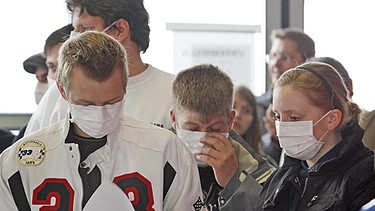 Symbolbild: Menschen während einer Pandemie-Übung  | Bild: BR