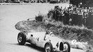 1936 Auto Union C type, Rosemeyer at German Grand Prix. Symbolbild mit Campus Talks Logo | Bild: picture alliance / Heritage-Images | National Motor Museum/Heritage Images