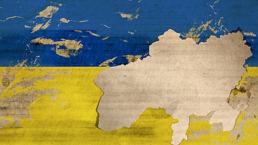 Ukraine-Flagge mit Umrisskarte des Landes | Bild: colourbox.com