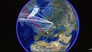 Weltkugel mit Datennetz-Linien | Bild: picture-alliance/dpa