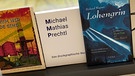 Mehrere Bücher auf einer Auslage | Bild: Verlage/Foto: BR