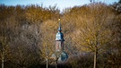Blick auf den Turm der Kapelle Sankt Wolfgang, in Ochsenfurt (Lkr. Würzburg). | Bild: Gabriel Bengerno, Ochsenfurt, 22.03.2018