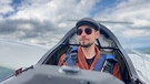 Benjamin Bachmaier im Cockpit seines Segelflugzeuges | Bild: Bayerischer Rundfunk 2024