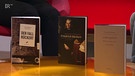 Die neue Biografie über Friedrich Rückert (mitte) sowie weitere Werke von und über den Dichter aus Franken | Bild: Bayerischer Rundfunk