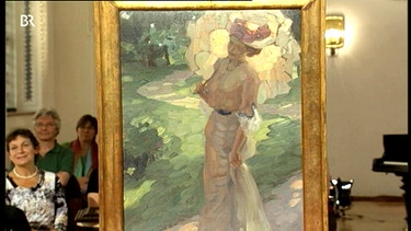 Die "Dame mit Sonnenschirm" steht in einem lichtdurchfluteten Park: Der Impressionist Leo Putz, ein berühmter Münchner Maler, hatte sie so meisterlich in Szene gesetzt. | Bild: Bayerischer Rundfunk