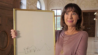 Sabine Sauer bei Kunst + Krempel in Schloss Schleißheim mit ihrer Zeichnung "John Lennon in der Wüste" | Bild: BR Fernsehen