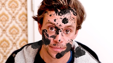 Checker Tobi mit Schmutz im Gesicht | Bild: megaherz