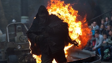 Stuntman Marcus Weber als lebende Fackel  | Bild: picture-alliance/dpa