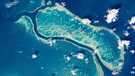 Australiens riesiges Korallenriff, das Great Barrier Reef, aus der Luft aufgenommen. | Bild: picture-alliance/dpa