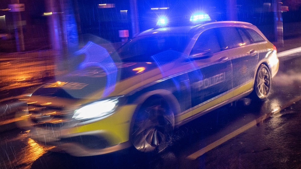 Polizeiauto mit Blaulicht | Bild: picture-alliance/dpa